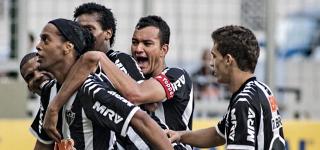 Puas, Mineiro Amankan Ronaldinho